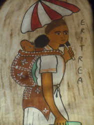 Caratterisco ed artigianale borsa in pelle eritreo porta bambino, e ombrello eritreo
